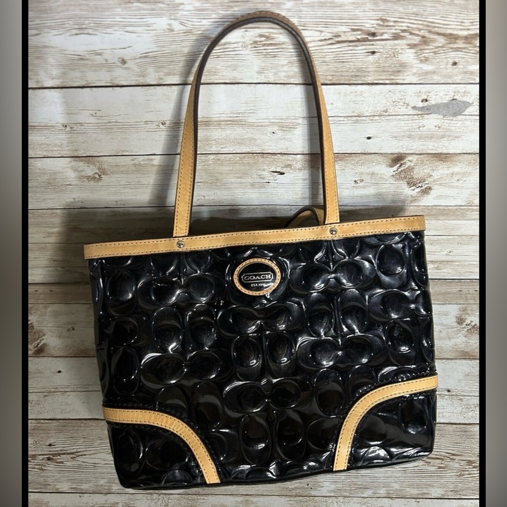 36. Coach Peyton black patent leather embossed tote bag